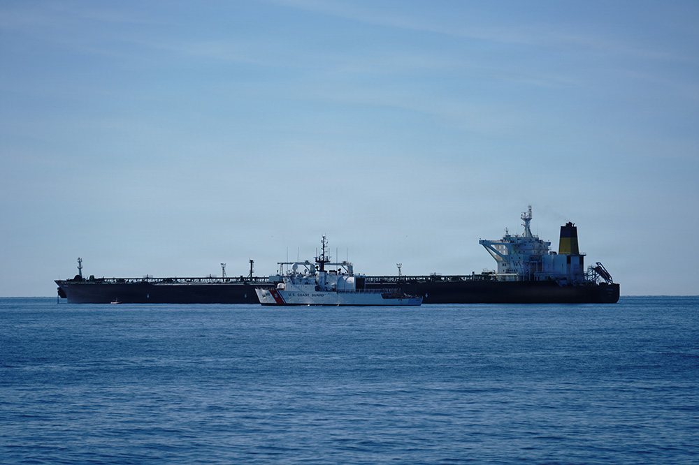 The US Coast Guard cutter Mohawk (WMEC 913) passes the motor tanker Veronica anchored off the coast of Ponce, Puerto Rico, on January 18, 2026. The crew of the Mohawk escorted the Venezuelan-bound tanker over a distance of 700 nautical miles. The vessel had been captured three days earlier by a Coast Guard tactical team with support from the US Department of War as part of Operation Southern Spear. (Photo: US Coast Guard), Sanctions