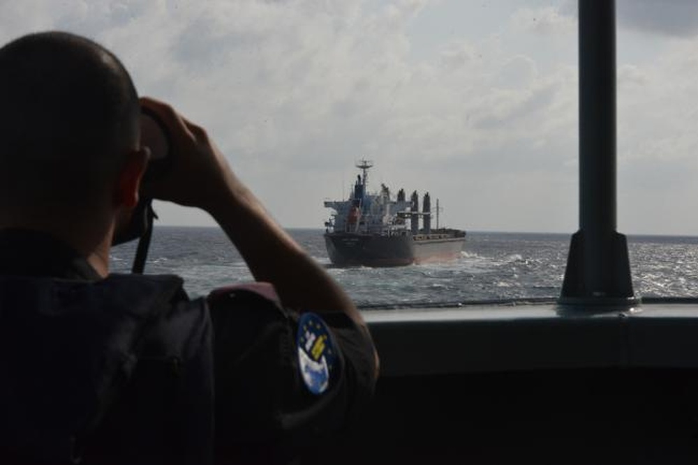 A military and a merchant ship