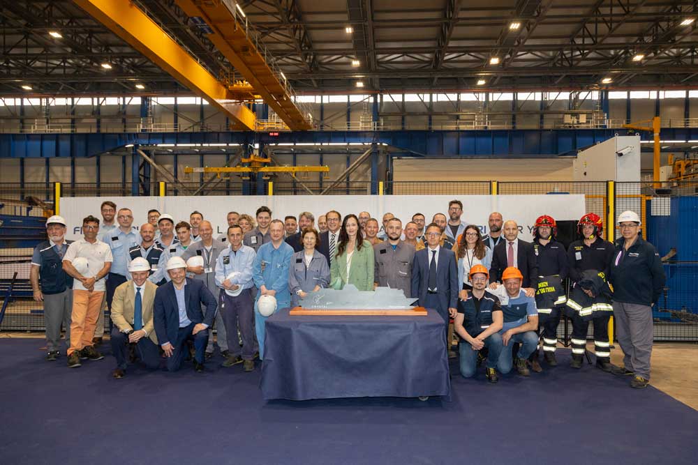 Fincantieri starts construction of "Crystal Grace" 1 Steel section of the "Crystal Grace" in Marghera, several people next to each other, a steel ship outline in the foreground