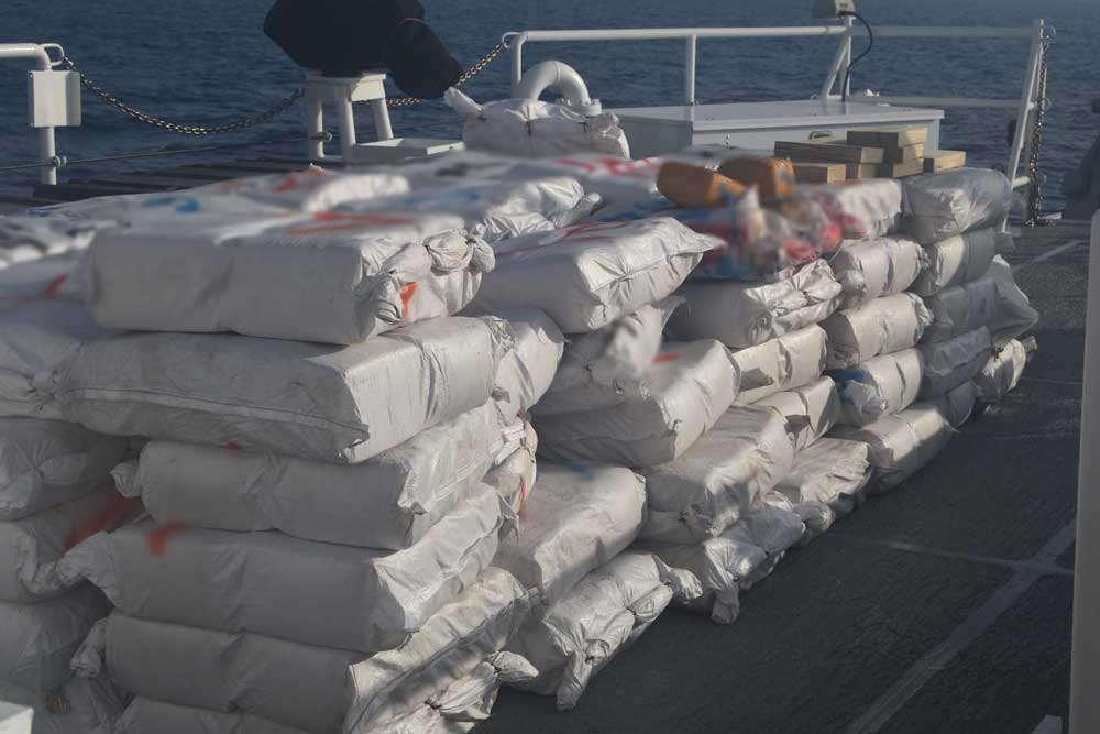 Stacked plastic bags on a coastguard boat