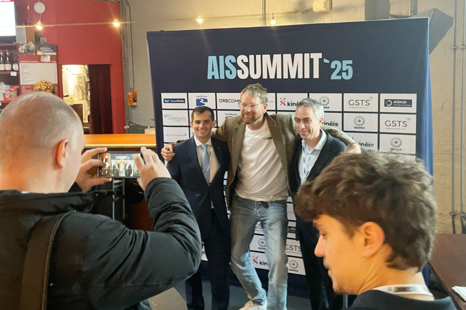 The organizer, Carsten Bullemer (center), gathered AIS experts from all over the world in Hamburg