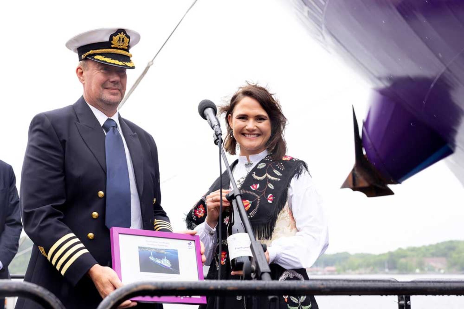 Hroar Skofteby, captain of the "Northern Pathfinder" ("K" Line Energy Shipping UK, left) and godmother Kari Nessa Nordtun, Minister of Education of Norway