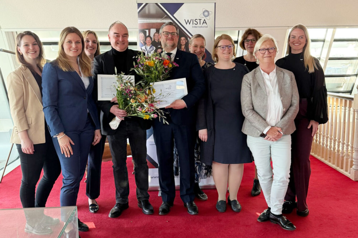 The WISTA Germany Board with the newly appointed ambassadors Jens Michael Priess (centre left) and Alexander Geisler (centre right)